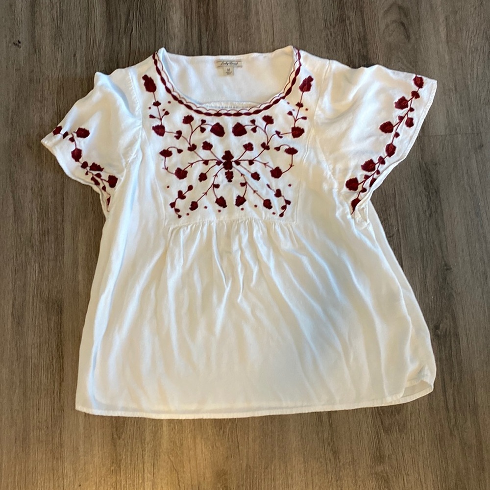 white blouse with flowers
